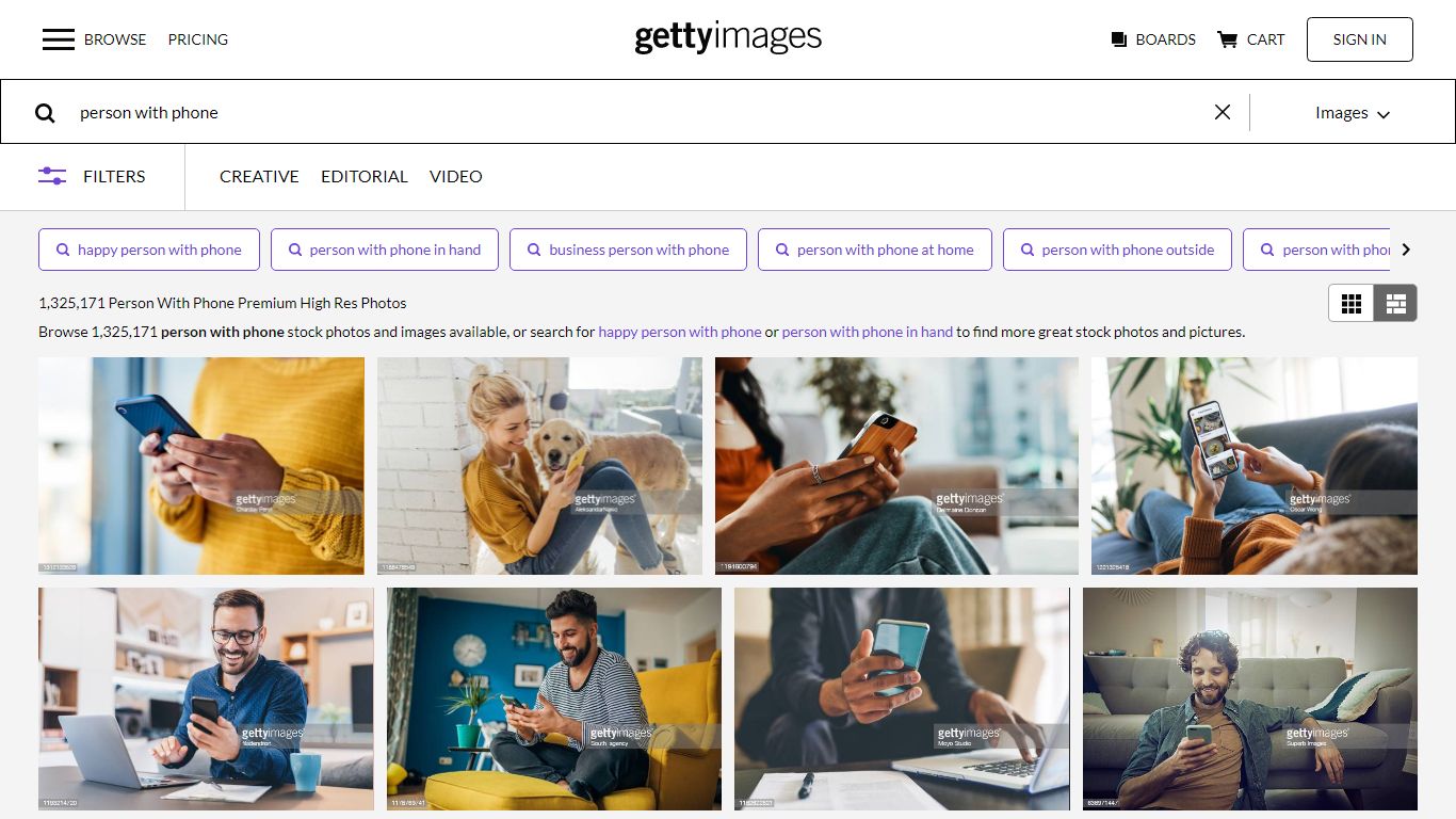 1,276,252 Person With Phone Premium High Res Photos